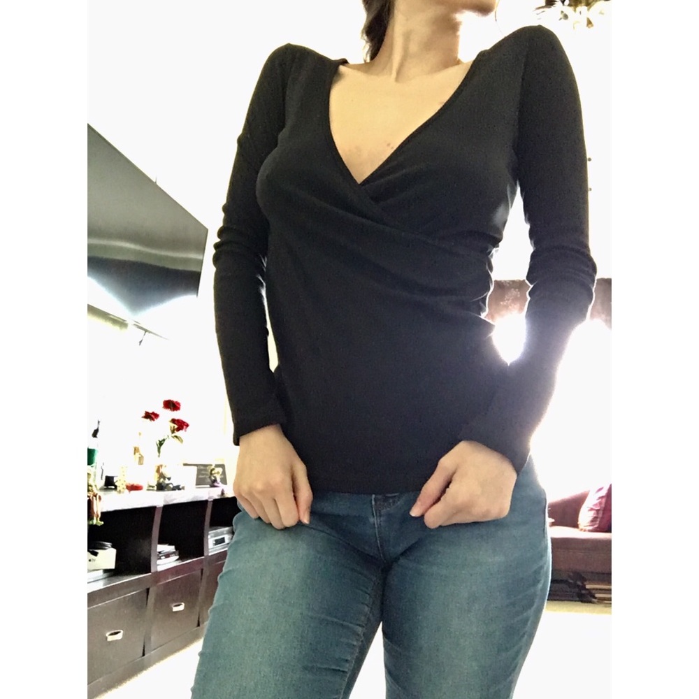 Black long sleeve top by the Tee Shop by VS